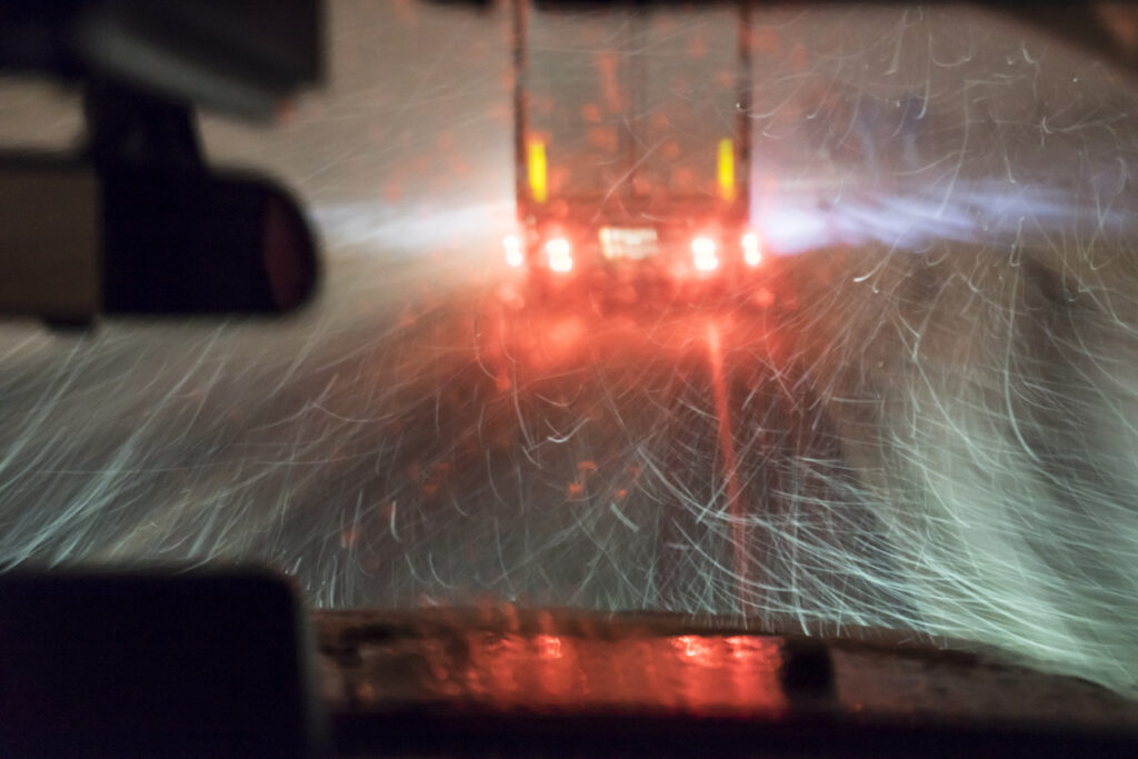 highway, driving at night during the blizzard