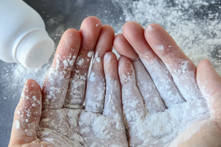 Hands covered in Talcum Powder - representing the risk of Mesothelioma