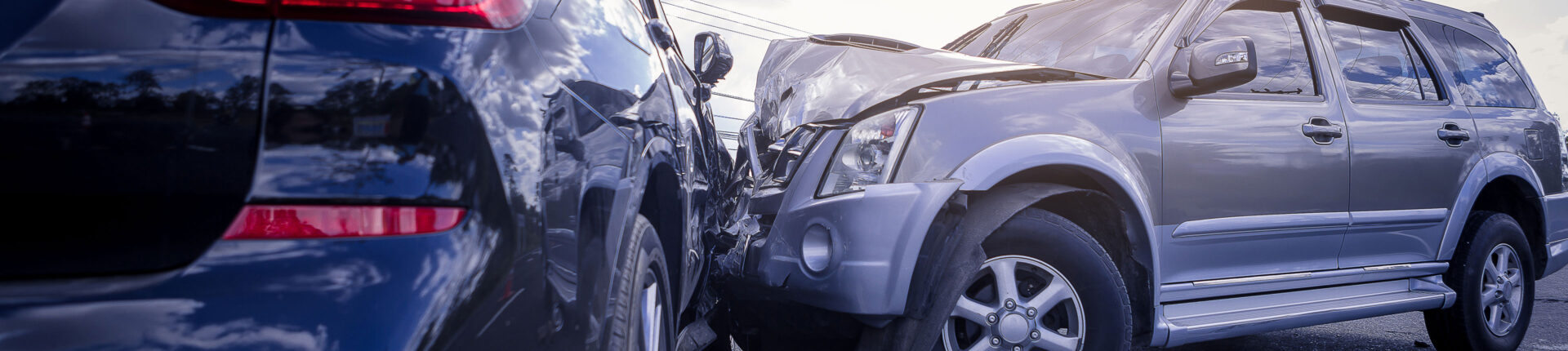 A wrecked car post-accident, illustrating the importance of consulting Slater and Zurz for legal support.