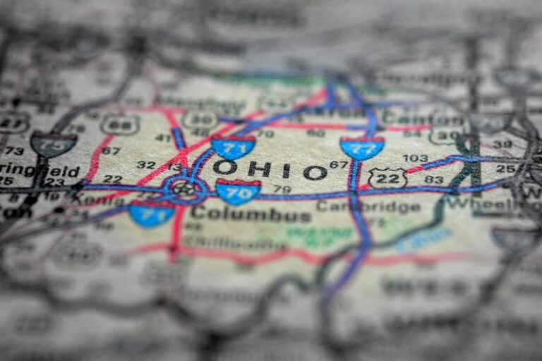 A close-up image of a map showing the state of Ohio, highlighting major highways and cities such as Columbus, and featuring some of the most dangerous highways in the region.