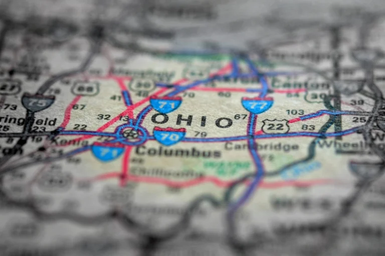 A close-up image of a map showing the state of Ohio, highlighting major highways and cities such as Columbus, and featuring some of the most dangerous highways in the region.