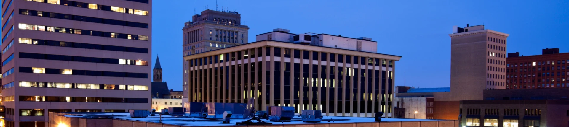 An image of the Canton, Ohio downtown skyline at dusk. Slater & Zurz Canton Ohio office location for personal injury and legal services